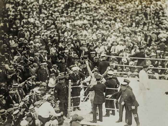Dempsey had Carpentier on the ropes before celebrating his fourth round knockout.